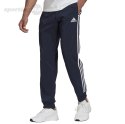 Spodnie męskie adidas Essentials Tapered Cuff 3 Stripes Pants granatowe GK8981 Adidas