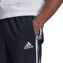 Spodnie męskie adidas Essentials Tapered Cuff 3 Stripes Pants granatowe GK8981 Adidas