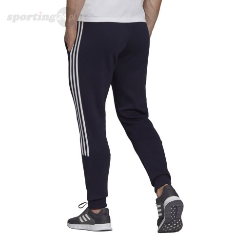Spodnie męskie adidas Essentials Tapered Cuff 3 Stripes granatowe GK8977 Adidas Spodnie męskie adidas Essentials Tapered Cuff 3 Stripes granatowe GK8977 Adidas