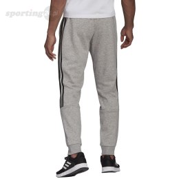 Spodnie męskie adidas Essentials Tapered Cuff 3 Stripes szare GK8976 Adidas