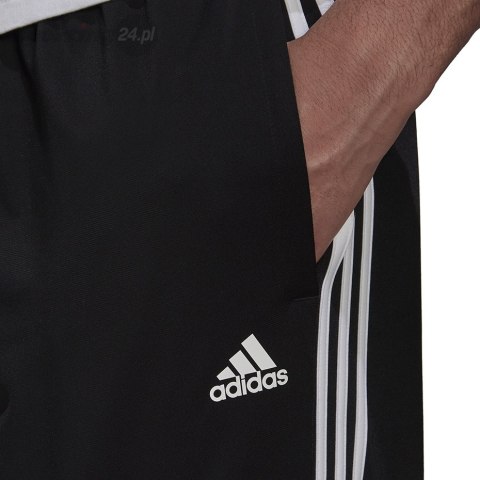 Spodnie męskie adidas Primegreen Essentials Warm-Up Tapered 3-Stripes Track czarne H46105 Adidas Spodnie męskie adidas Primegreen Essentials Warm-Up Tapered 3-Stripes Track czarne H46105 Adidas
