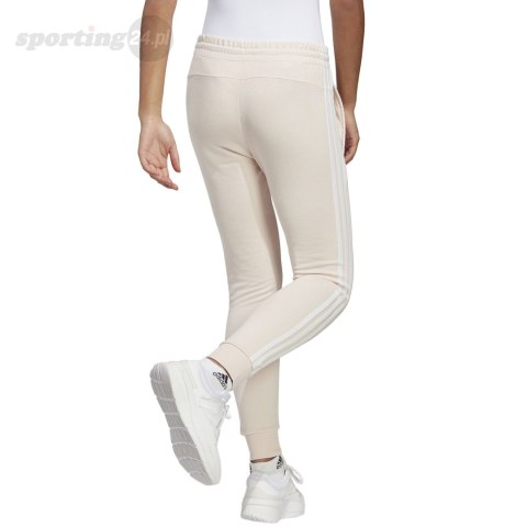 Spodnie damskie adidas Essentials 3-Stripes French Terry Cuffed kremowe IC9924 Adidas Spodnie damskie adidas Essentials 3-Stripes French Terry Cuffed kremowe IC9924 Adidas