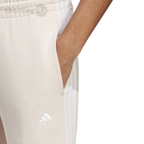 Spodnie damskie adidas Essentials 3-Stripes French Terry Cuffed kremowe IC9924 Adidas Spodnie damskie adidas Essentials 3-Stripes French Terry Cuffed kremowe IC9924 Adidas