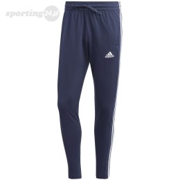 Spodnie męskie adidas Essentials Single Jersey Tapered Open Hem 3-Stripes granatowe IC0045 Adidas