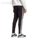 Spodnie męskie adidas Essentials Single Jersey Tapered Open Hem 3-Stripes czarne IC0044 Adidas