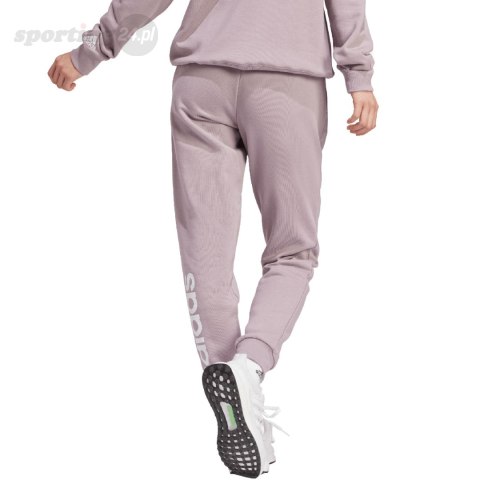Spodnie damskie adidas Essentials Linear French Terry Cuffed fioletowe IS2105 Adidas Spodnie damskie adidas Essentials Linear French Terry Cuffed fioletowe IS2105 Adidas