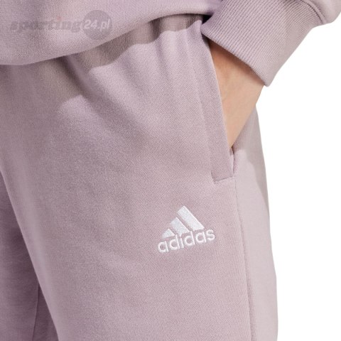 Spodnie damskie adidas Essentials Linear French Terry Cuffed fioletowe IS2105 Adidas Spodnie damskie adidas Essentials Linear French Terry Cuffed fioletowe IS2105 Adidas