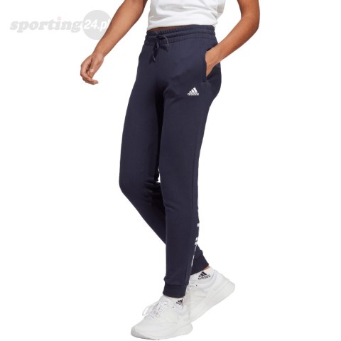 Spodnie damskie adidas Essentials Linear French Terry Cuffed granatowe IC6869 Adidas Spodnie damskie adidas Essentials Linear French Terry Cuffed granatowe IC6869 Adidas