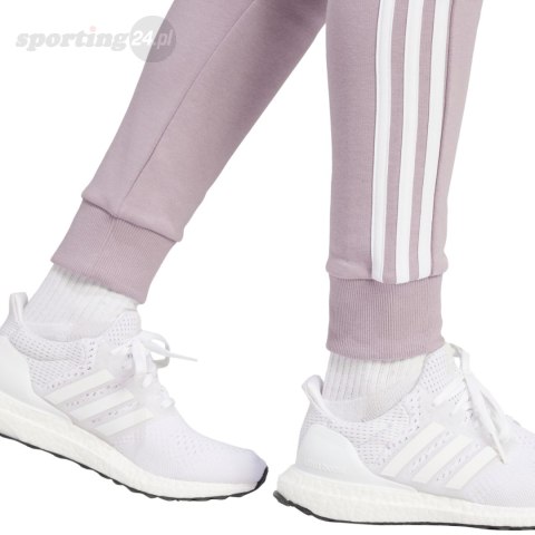 Spodnie damskie adidas Essentials 3-Stripes Fleece fioletowe IR5403 Adidas Spodnie damskie adidas Essentials 3-Stripes Fleece fioletowe IR5403 Adidas