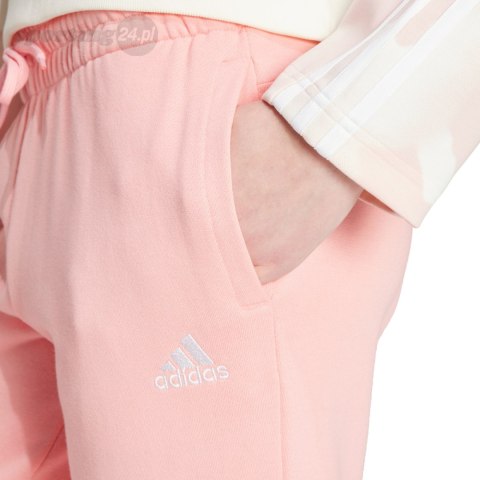 Spodnie damskie adidas Linear French Terry Cuffed jasnoróżowe IY9200 Adidas Spodnie damskie adidas Linear French Terry Cuffed jasnoróżowe IY9200 Adidas