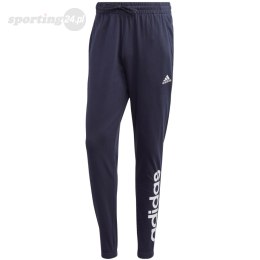 Spodnie męskie adidas Essentials Single Jersey Tapered Elasticized Cuff Logo granatowe IC0056 Adidas