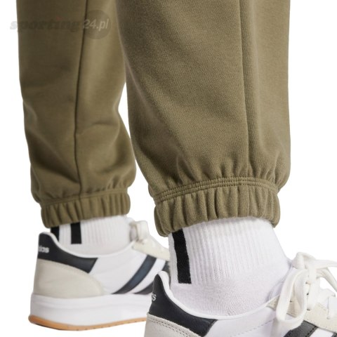 Spodnie damskie adidas Essentials Small Logo French Terry Cuffed zielone JD9927 Adidas Spodnie damskie adidas Essentials Small Logo French Terry Cuffed zielone JD9927 Adidas
