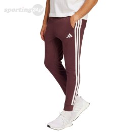 Spodnie męskie adidas Essentials 3-Stripes Fleece bordowe JD1853 Adidas