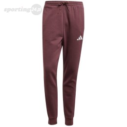 Spodnie męskie adidas Essentials 3-Stripes Fleece bordowe JD1853 Adidas